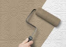 applying wallpaper with a paint roller