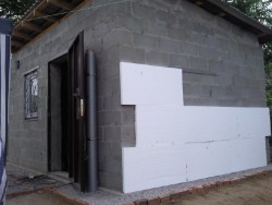 insulation of the walls of the house with foam